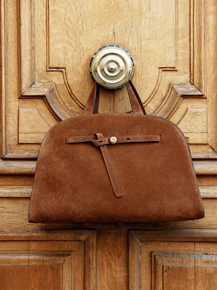 Tory Burch's Ever-Popular Romy Family of Bags Just Got a New Edition 12 Tory Burch Romy Bauletto Suede Medium